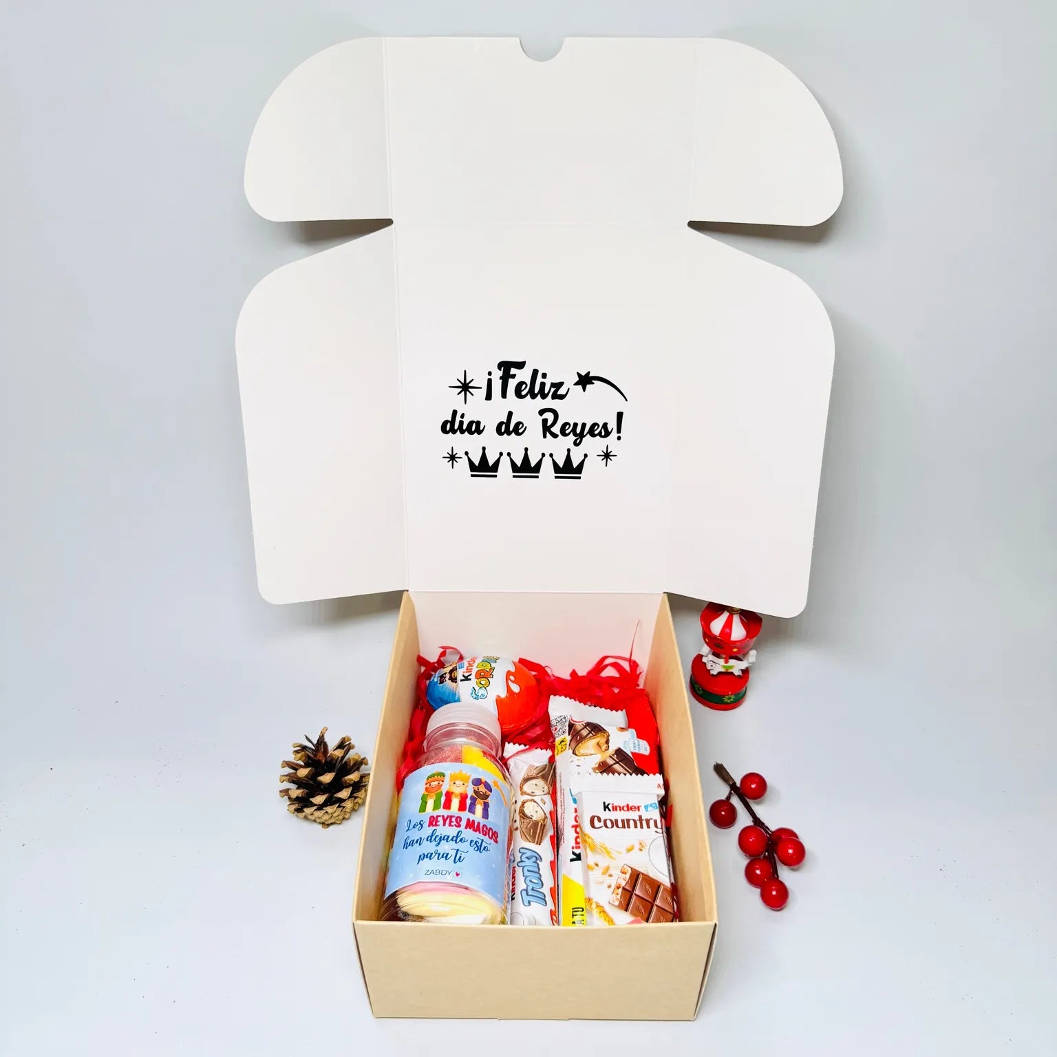 Caja Especial “Los Reyes Magos han dejado esto para ti” – Dulces Kinder y Botella de Gominolas